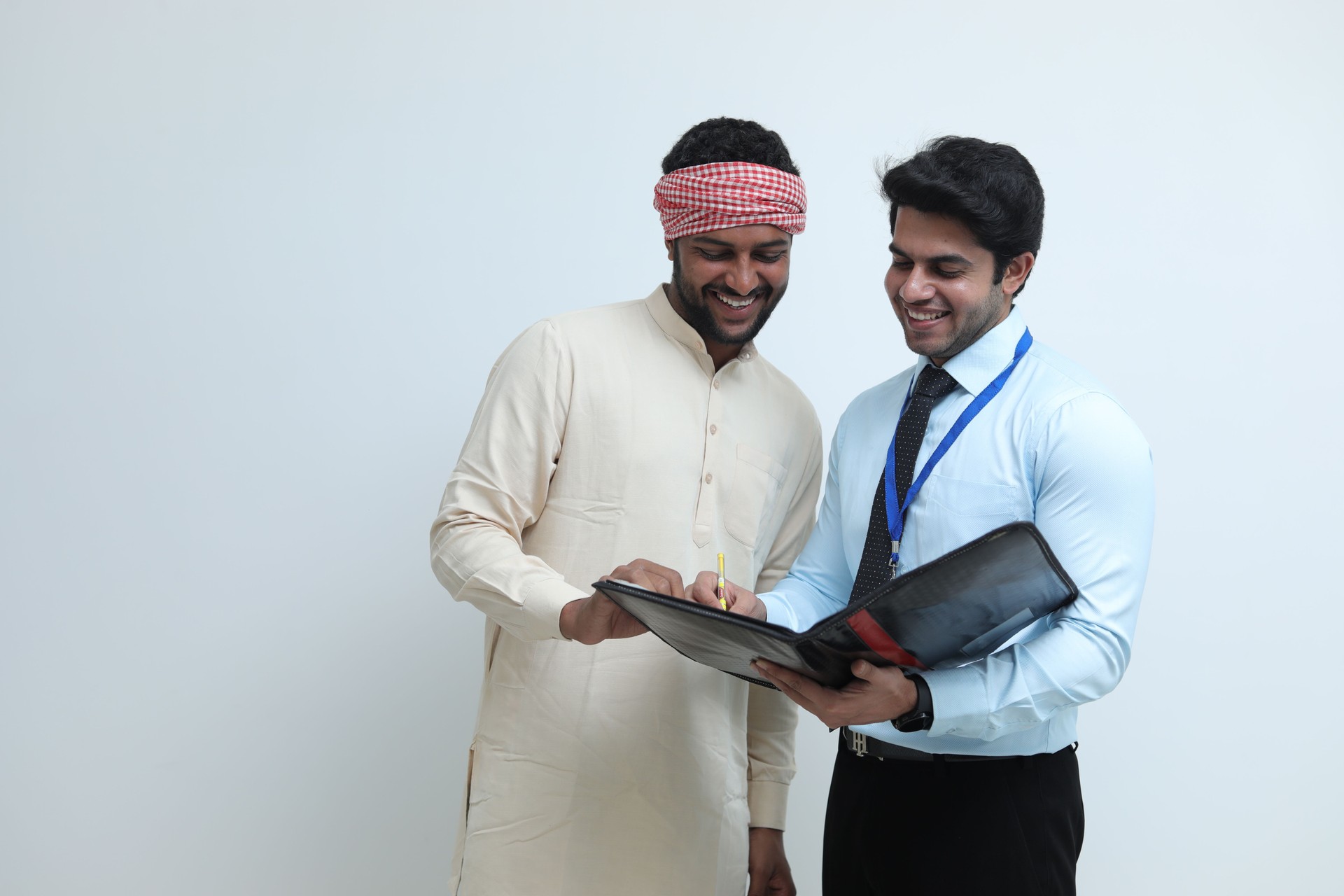 salesperson guidance and happy villager - stock images